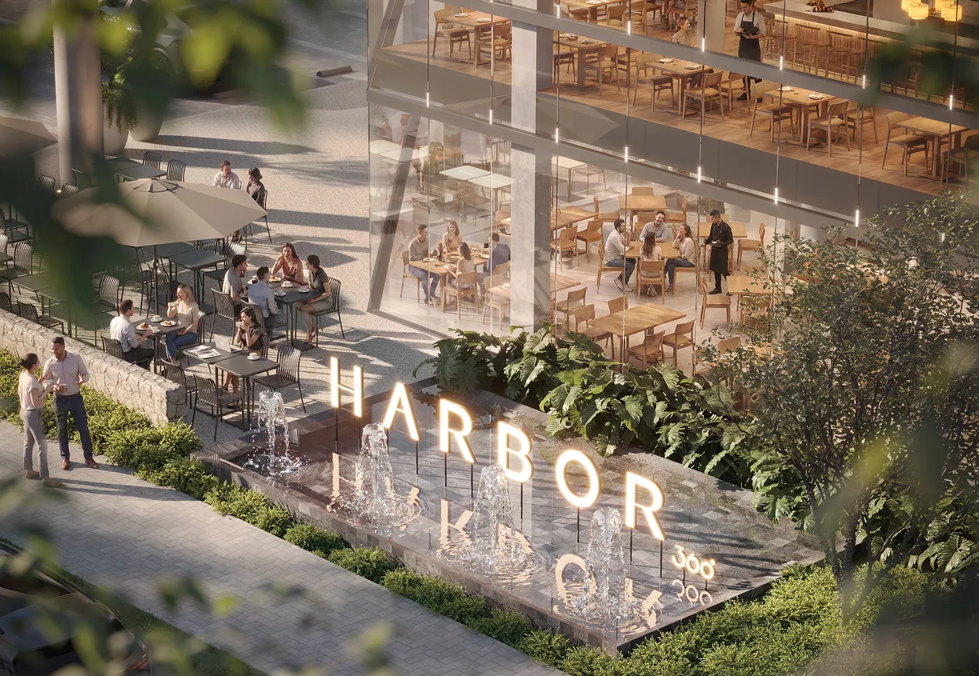Letreiro HARBOR no boulevard do mall, com mesas e paisagismo